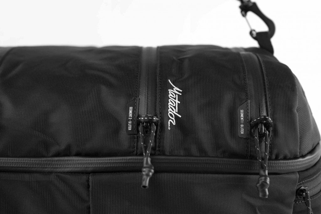 Matador SEG45 Travel Pack- robuster Rucksck mit segmentierten Taschen wie Würfel
